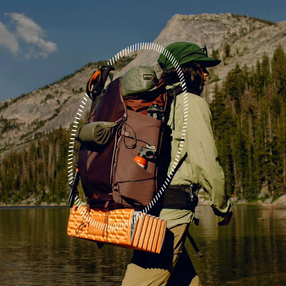 Man carrying an Eclipse Outdoor Backpack